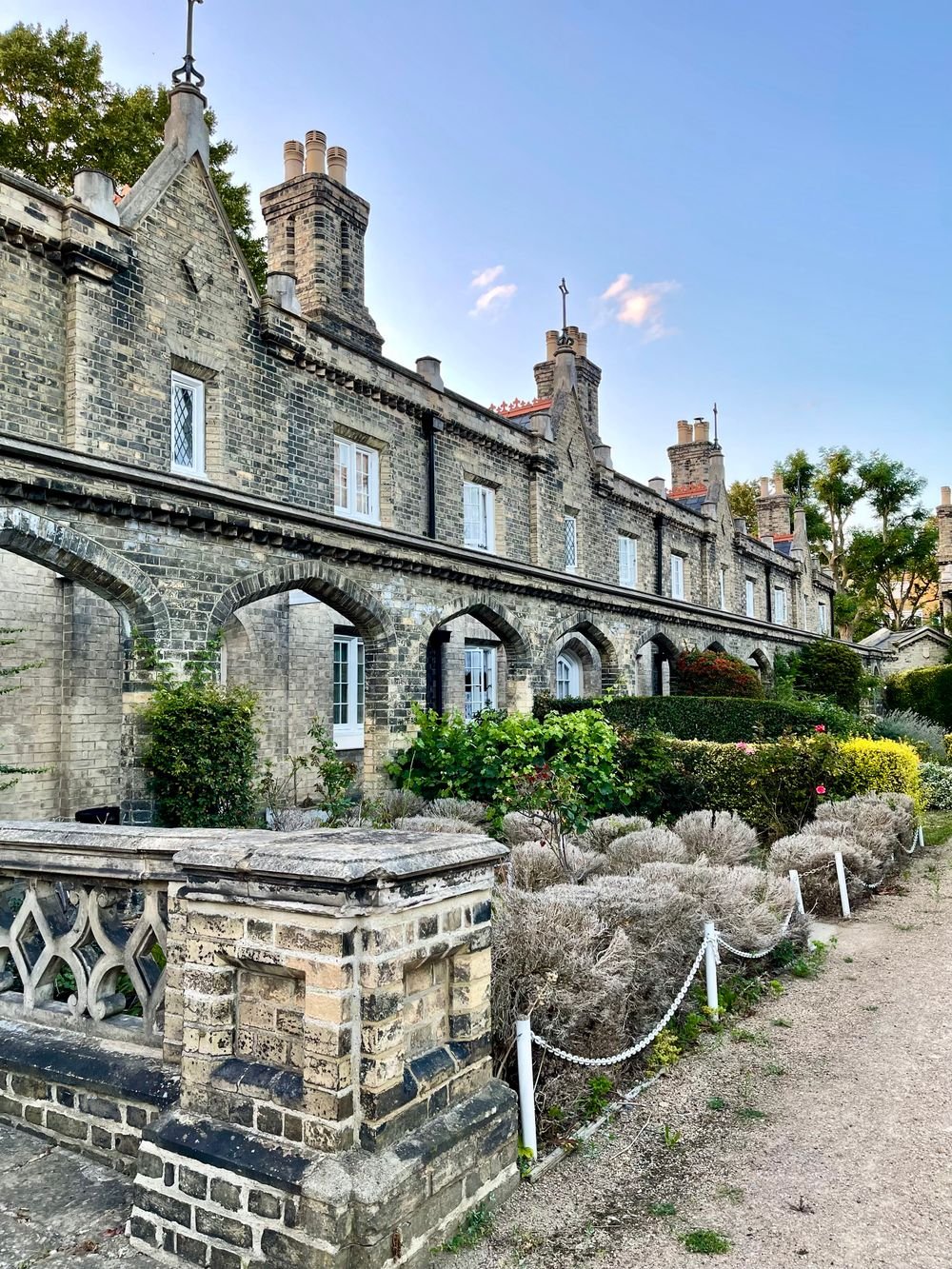 Traditional homes beside a garden